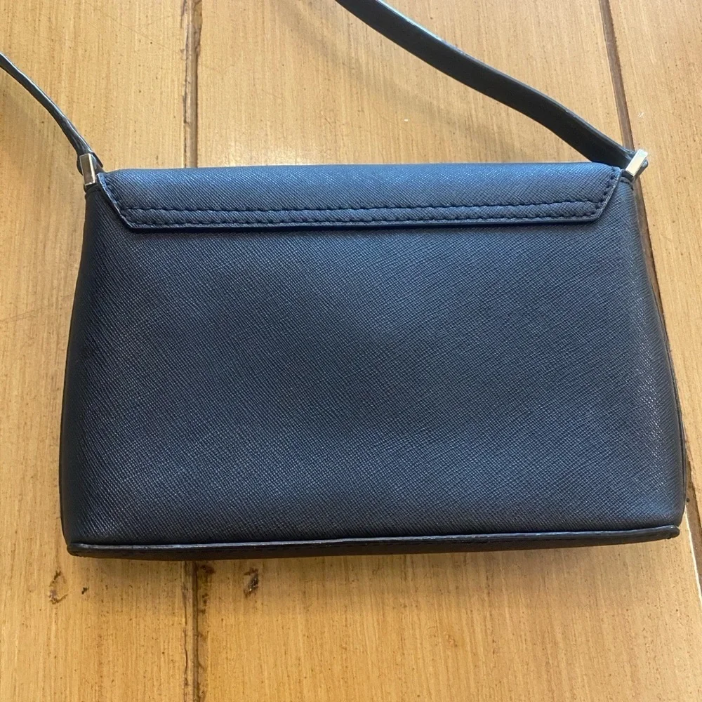 Kate Spade Newbury Lane Sally Black Leather Turn Lock Crossbody Bag gently used